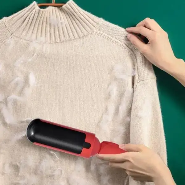 Pet hair remover on carpet