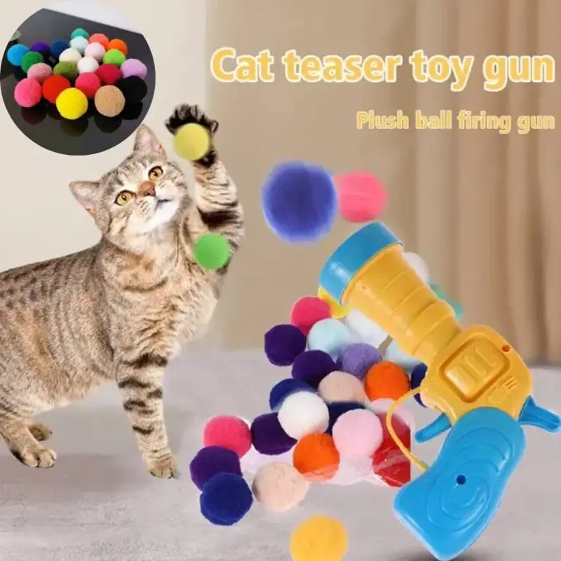 Cat playing with ball launcher