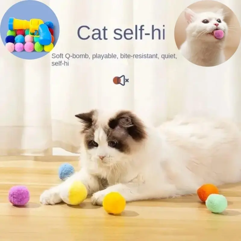 Cat playing with ball launcher